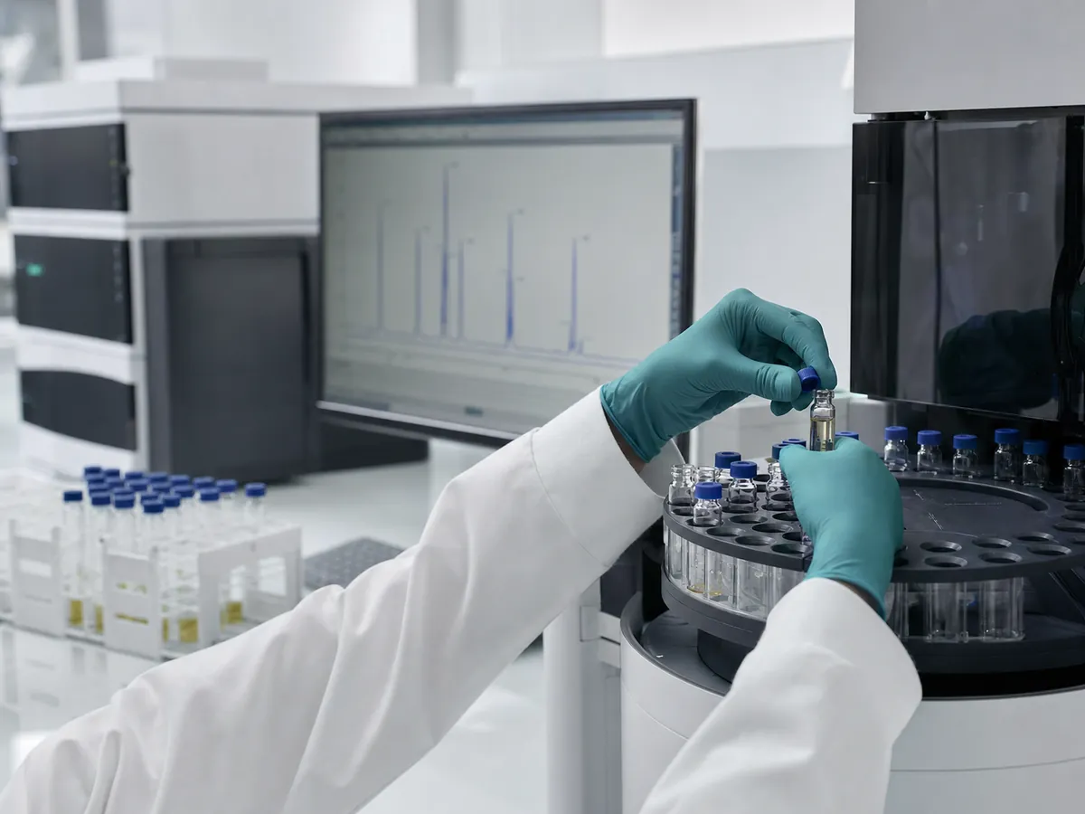 Analyst preparing peptide samples for quality-control testing